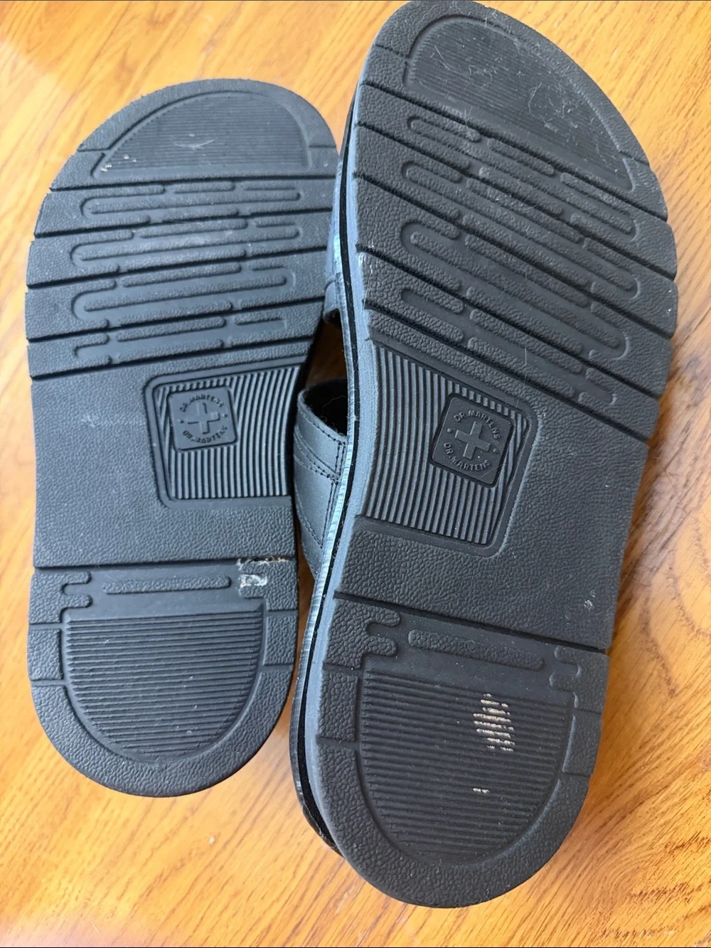 Dr. Martens Black Leather Slide Sandals with Yellow Stitching